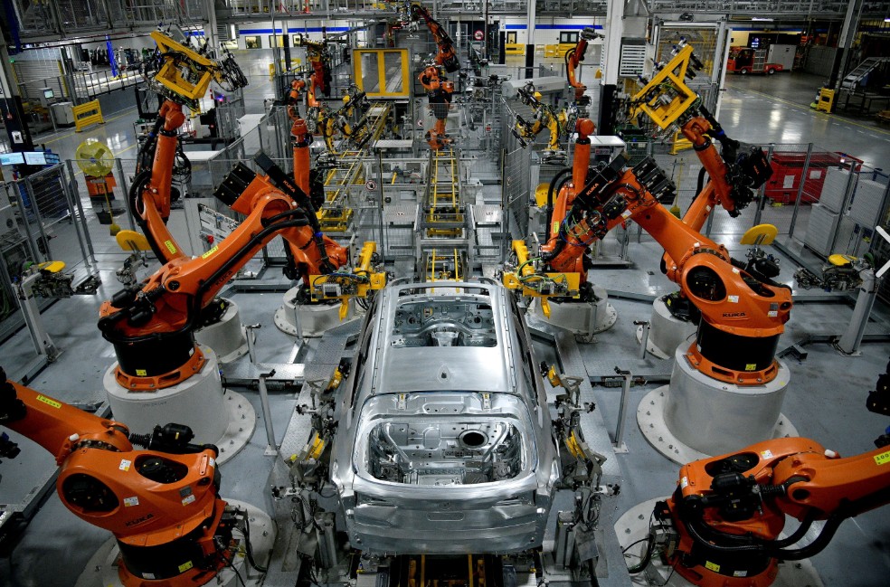 Automotive assembly line robots providing real-time shop floor to top floor visibility