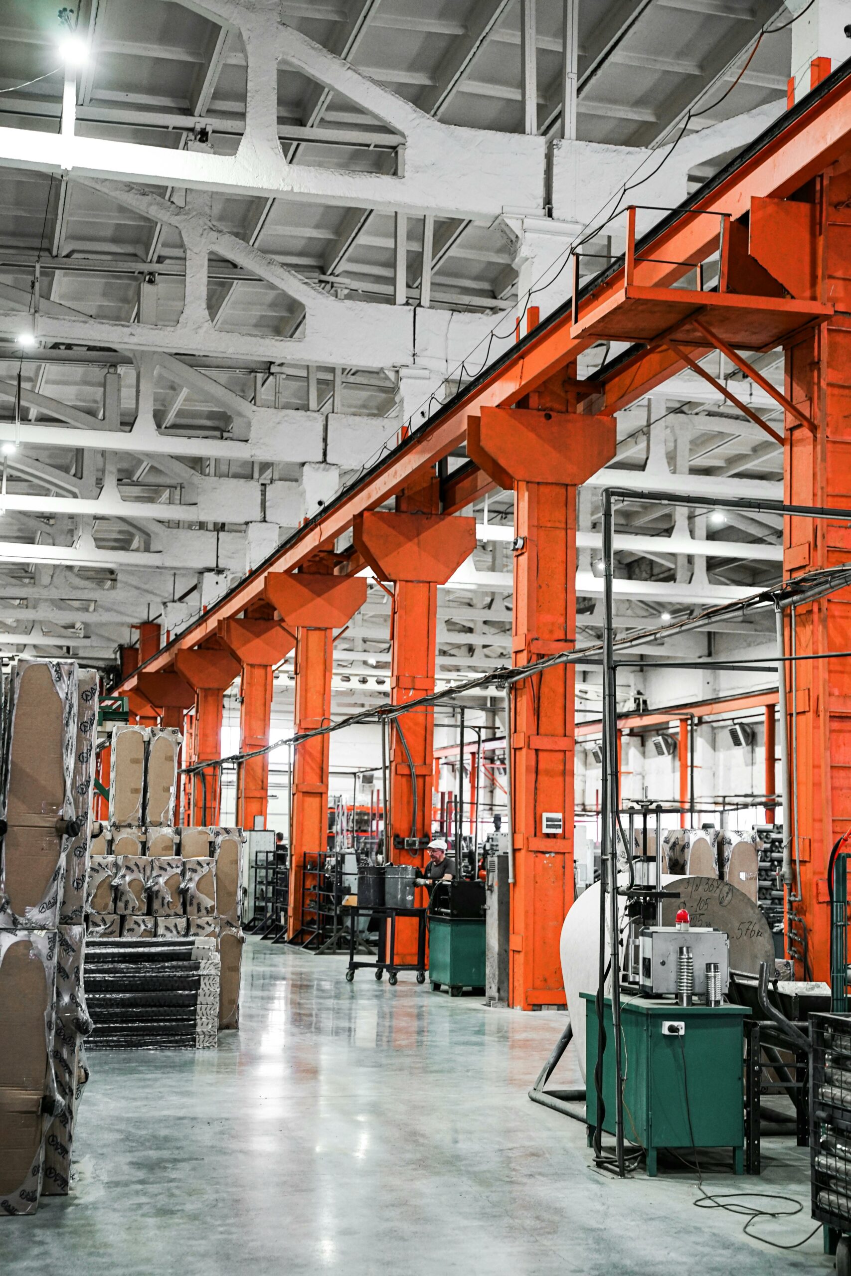 Industrial factory floor with machinery and equipment, representing machine-first architecture in smart manufacturing